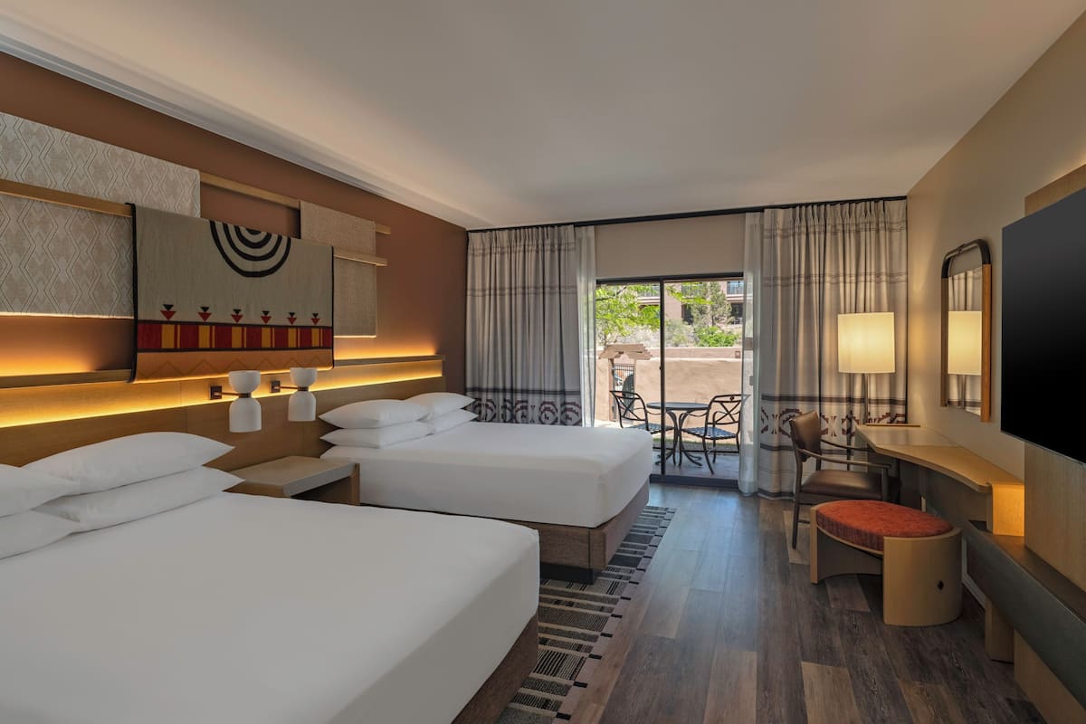 Premium bedding, down comforters, pillowtop beds, in-room safe