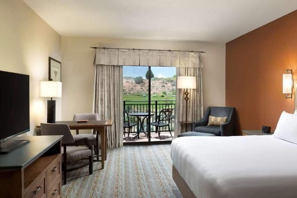 Premium bedding, down comforters, pillowtop beds, in-room safe