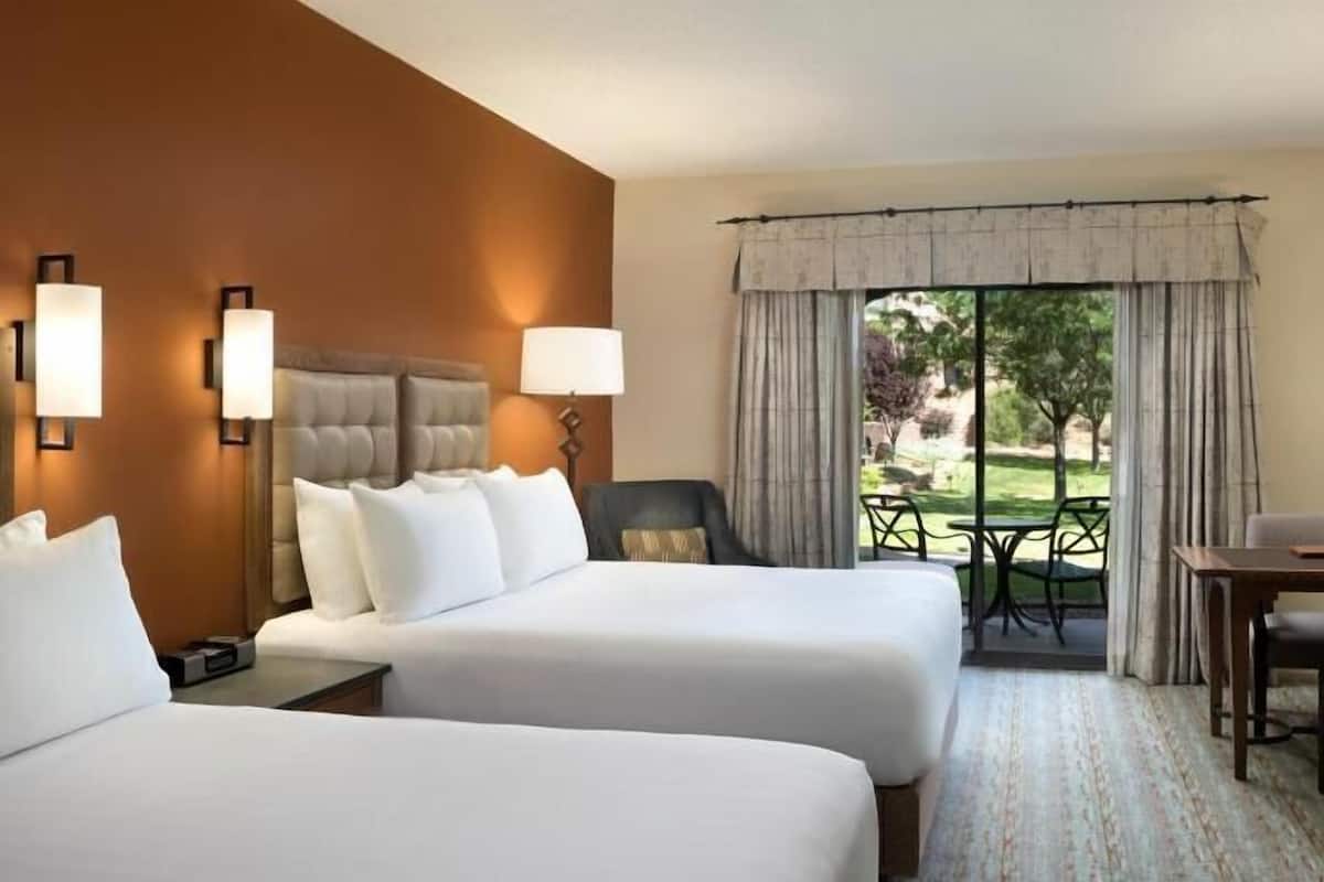 Premium bedding, down comforters, pillowtop beds, in-room safe