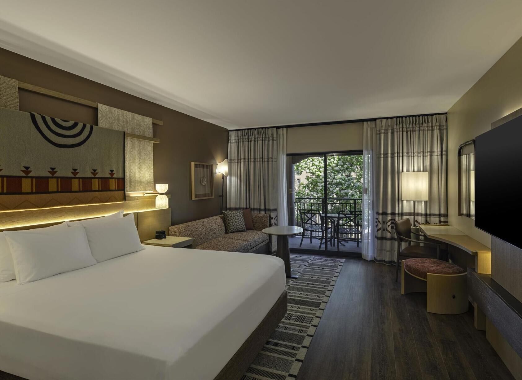 Premium bedding, down comforters, pillowtop beds, in-room safe