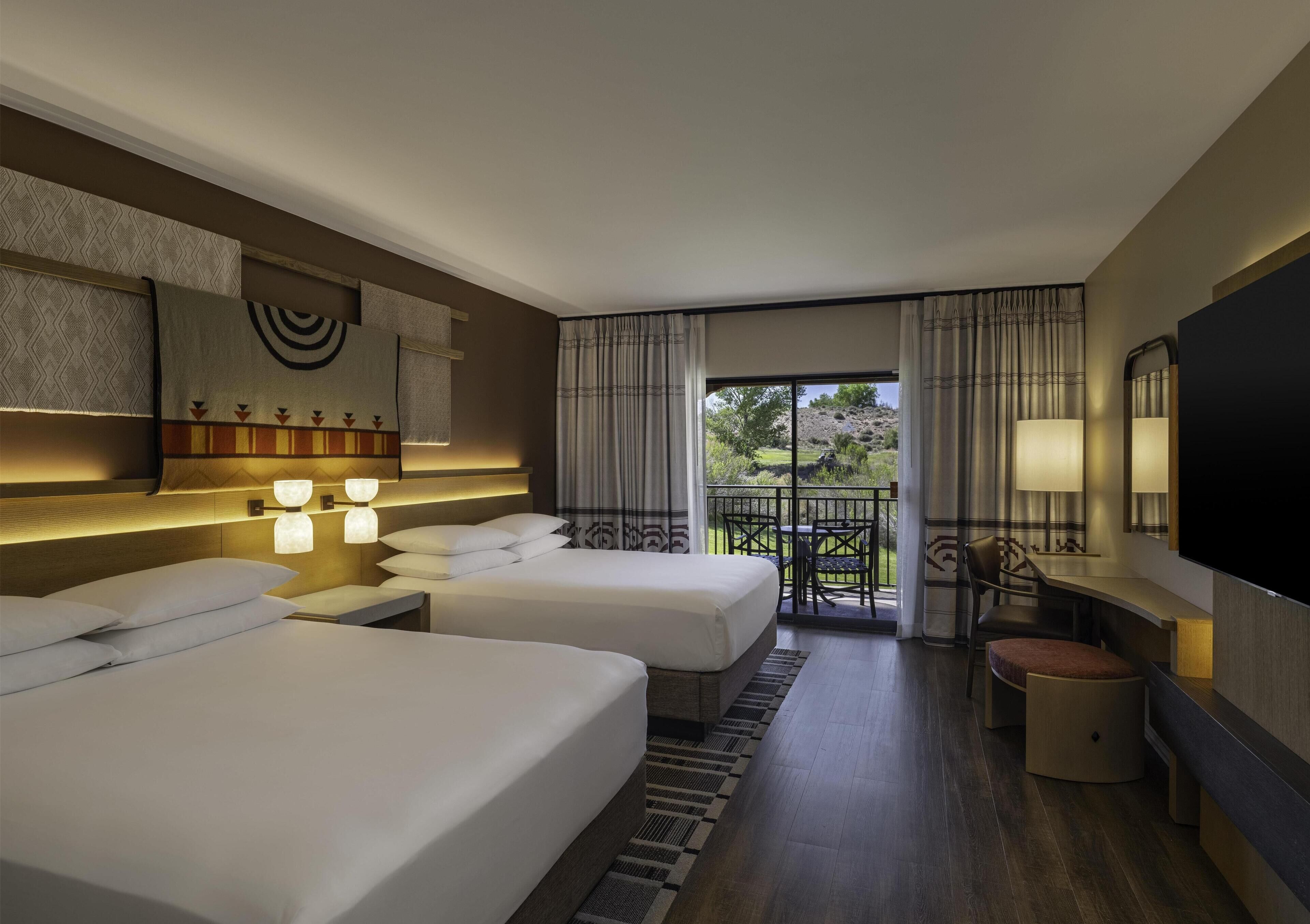 Premium bedding, down duvets, pillow-top beds, in-room safe