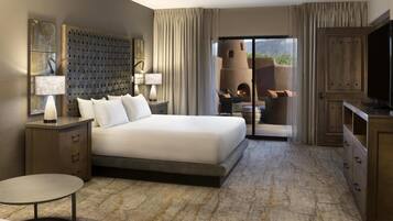 Premium bedding, down comforters, pillowtop beds, in-room safe