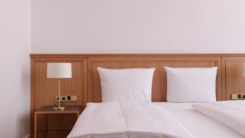 Habitación doble Confort | Ropa de cama hipoalergénica y caja de seguridad en la habitación