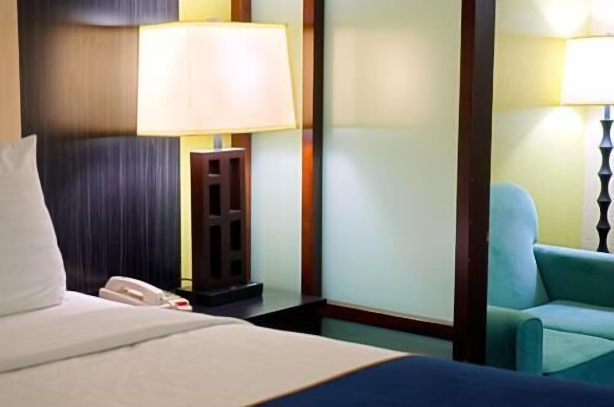 Premium bedding, pillow-top beds, in-room safe, laptop workspace
