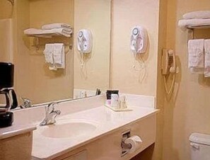 Combined shower/tub, deep soaking tub, free toiletries, hair dryer