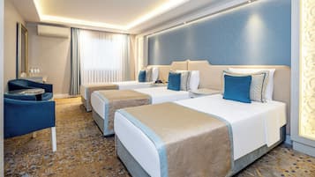 Triple Room | Minibar, in-room safe, soundproofing, free WiFi