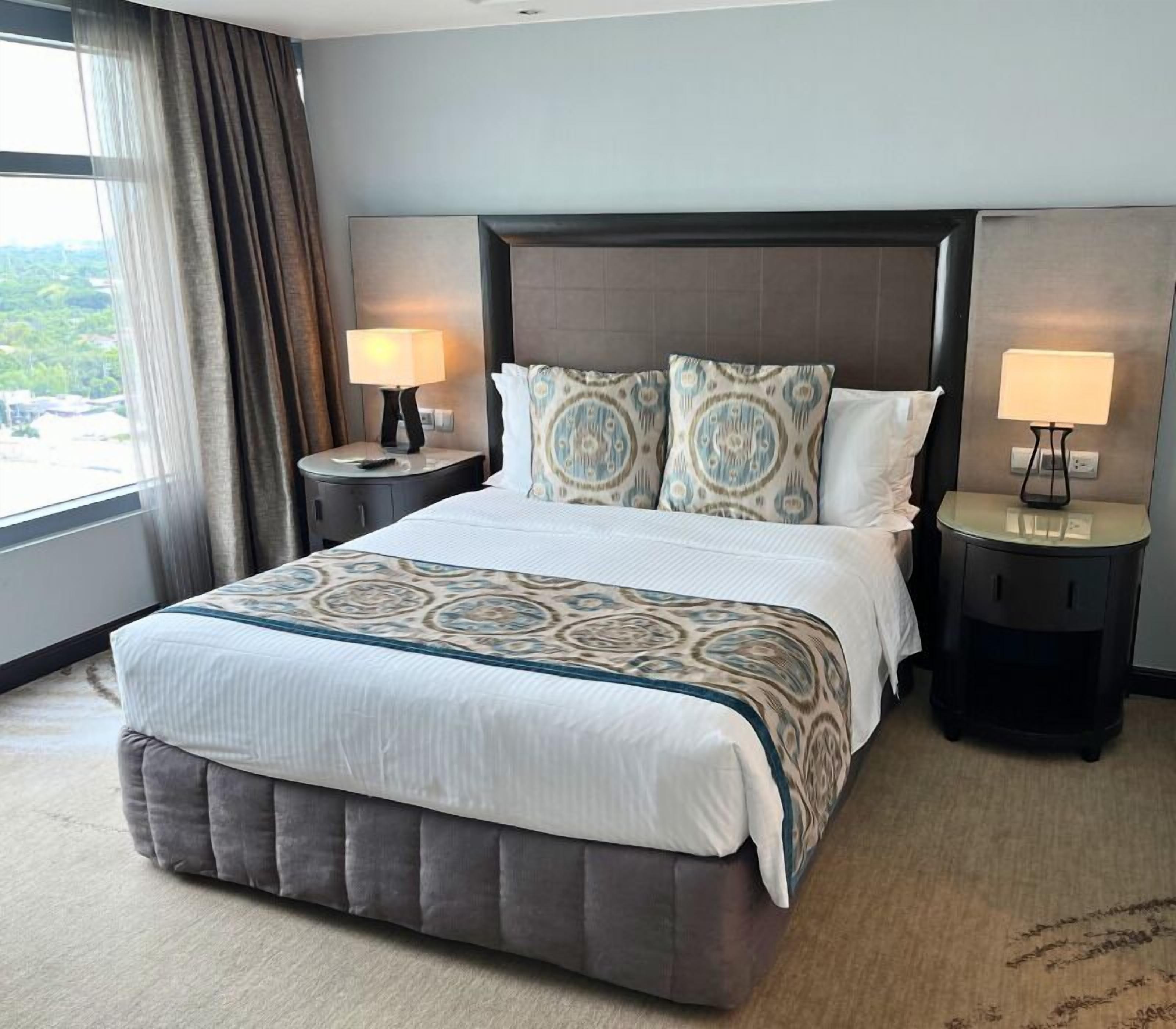 Deluxe Room, 2 Bedrooms | In-room safe, individually decorated, individually furnished, desk