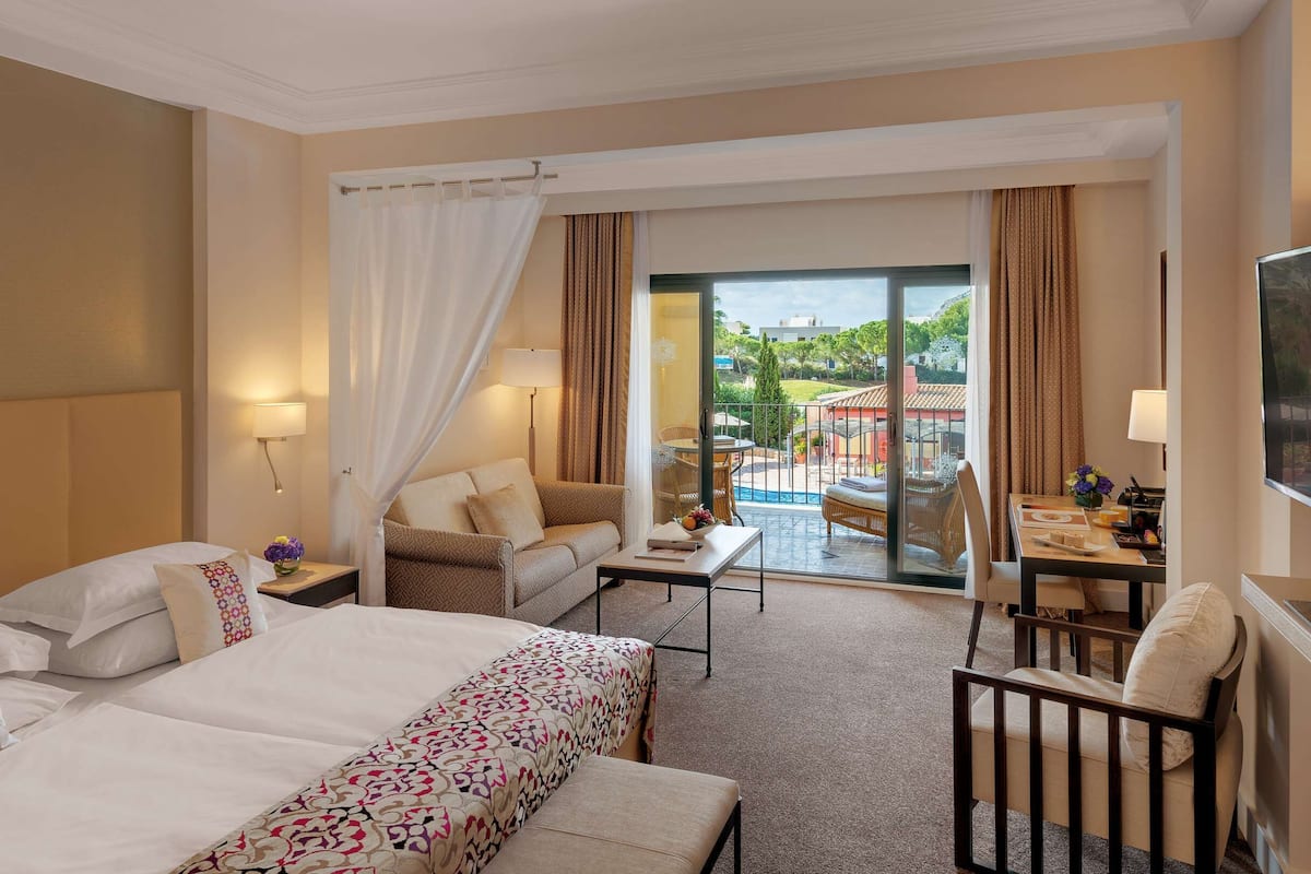 superior room, pool view | 1 bedroom, hypo-allergenic bedding, down duvets, minibar
