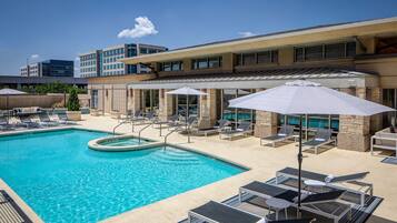 Outdoor pool, pool umbrellas, sun loungers