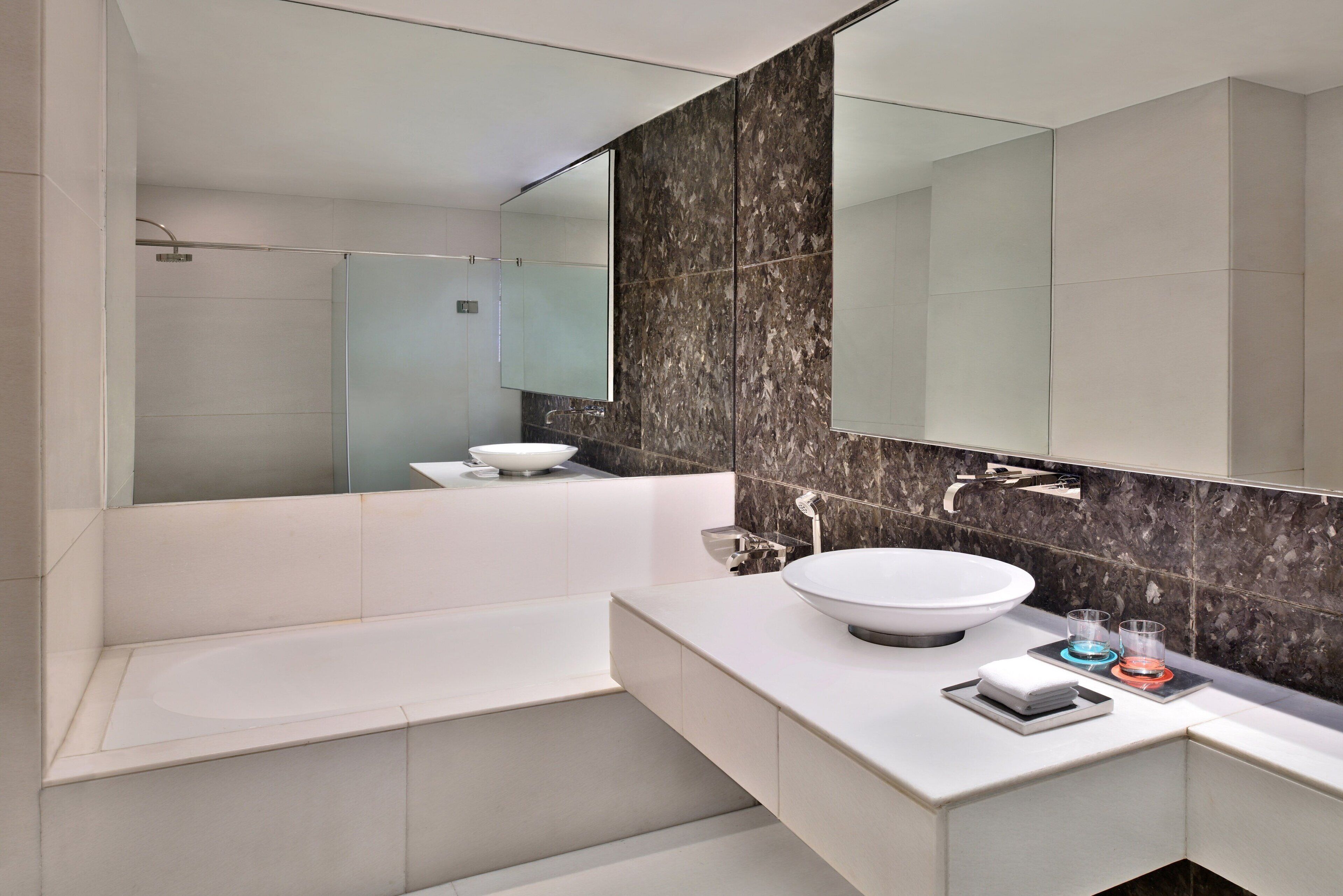 luxury suite, 2 bedrooms | bathroom | deep-soaking bathtub, designer toiletries, hair dryer, bathrobes