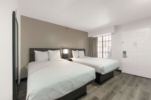 Premium bedding, laptop workspace, iron/ironing board, free WiFi