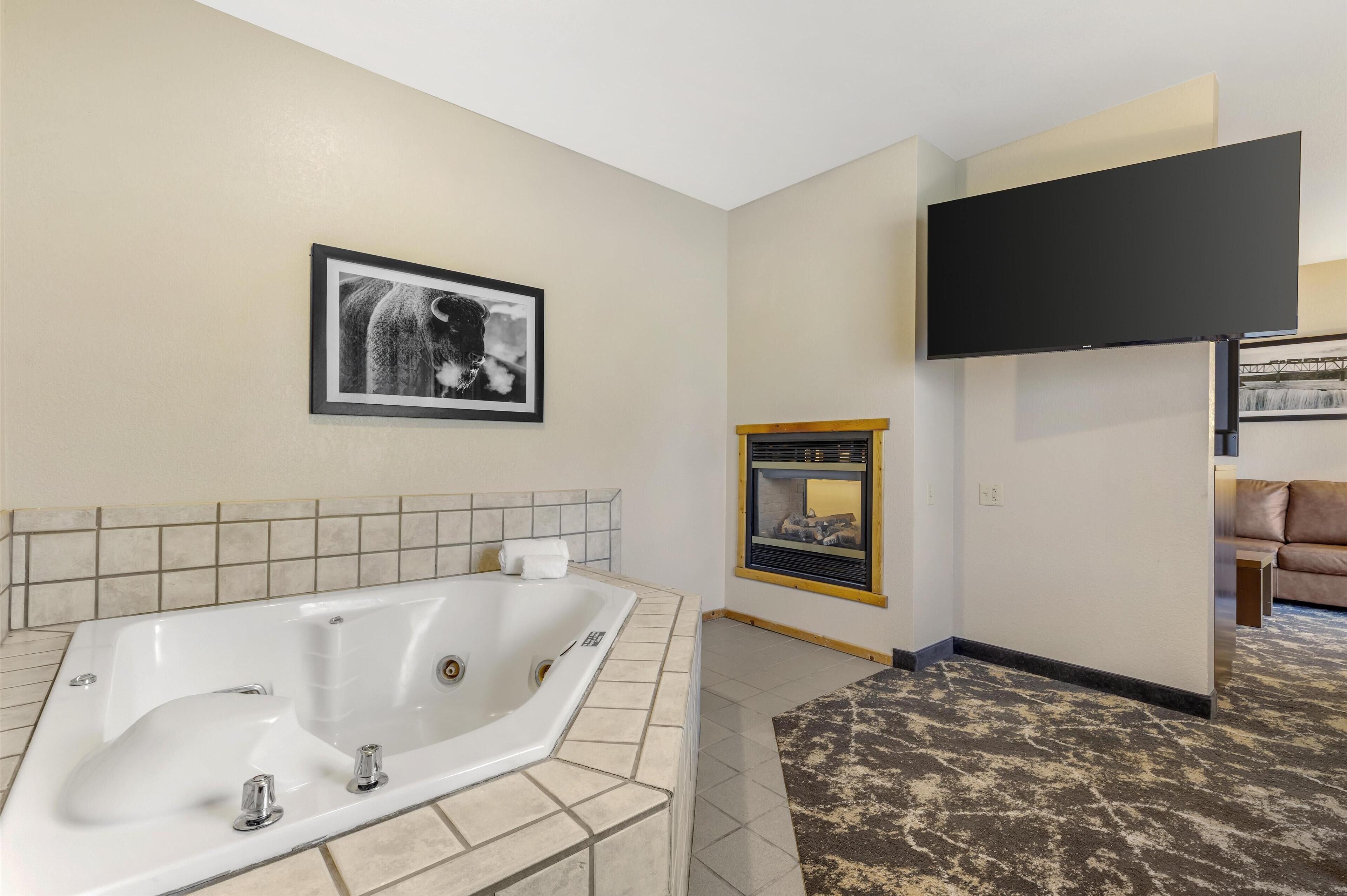 suite, 1 king bed, jetted tub, river view | 1 bedroom, premium bedding, pillow-top beds, laptop workspace