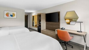A hotel room with two beds, a desk with a chair, a television, and a mirror. - Holiday Inn Express & Suites Baltimore West - Catonsville by IHG (Catonsville)
