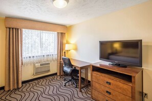 Pillow-top beds, laptop workspace, blackout curtains, iron/ironing board