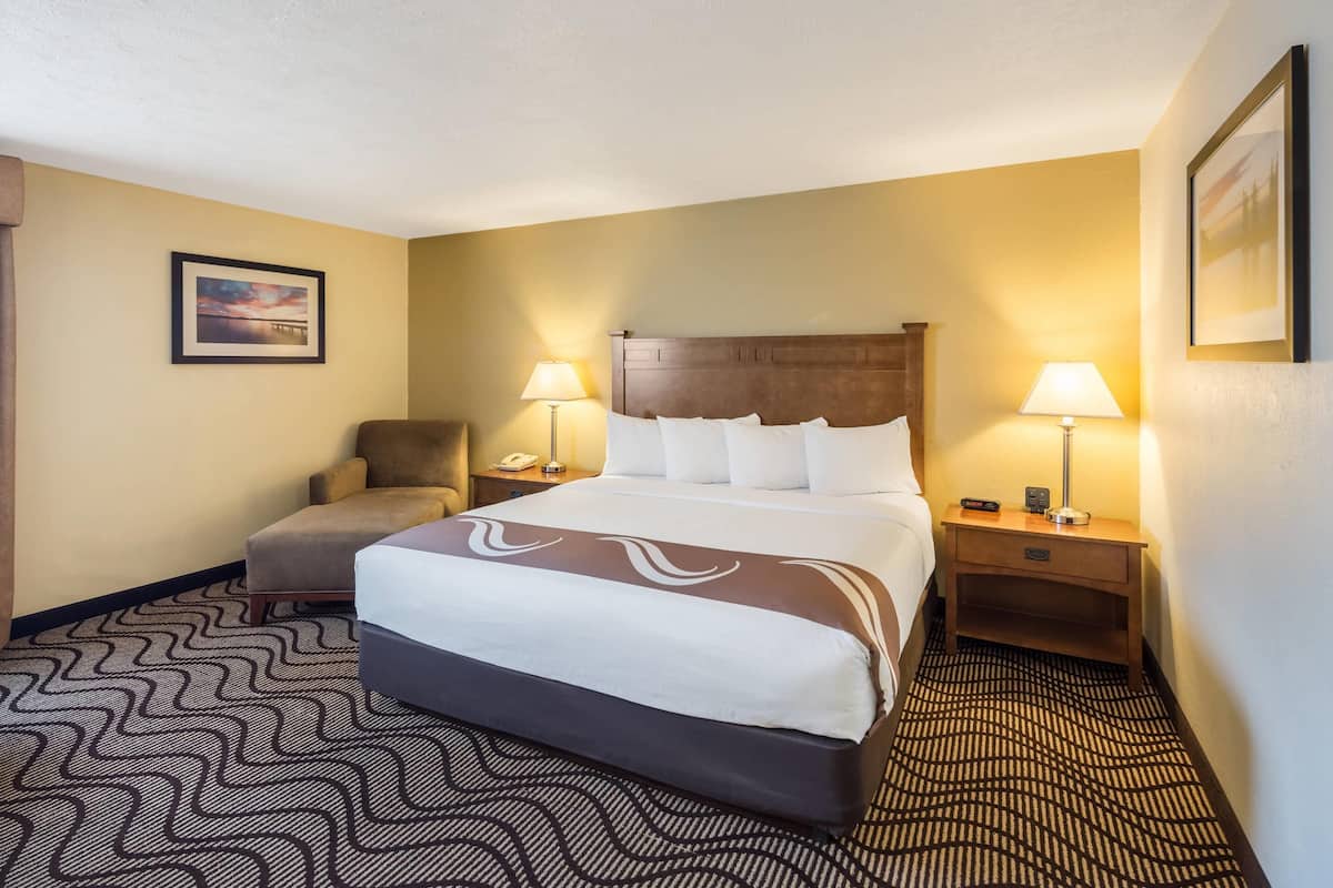 Suite, 1 King Bed, Non Smoking | Pillowtop beds, laptop workspace, blackout drapes, iron/ironing board