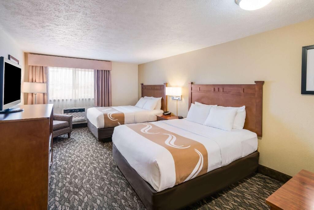 Pillowtop beds, laptop workspace, blackout drapes, iron/ironing board