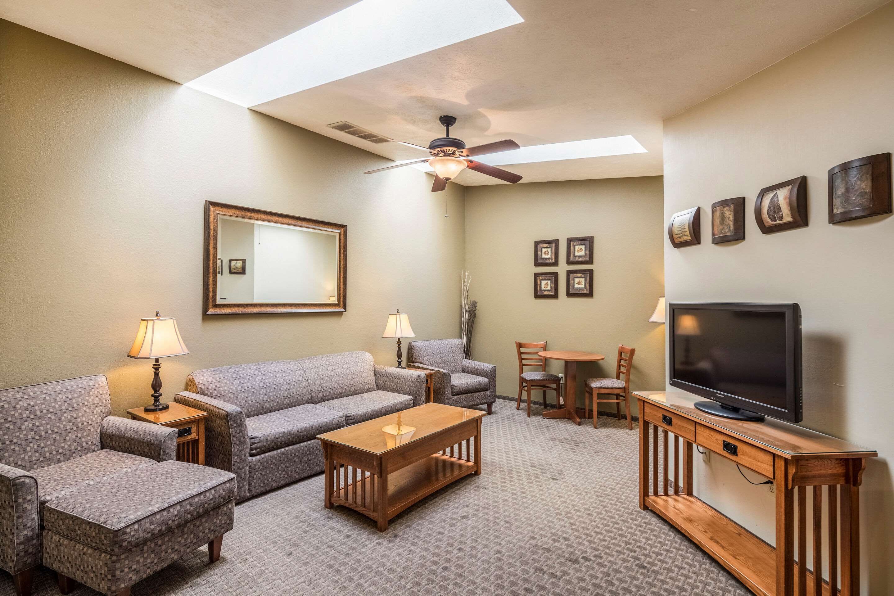 Pillowtop beds, laptop workspace, blackout drapes, iron/ironing board