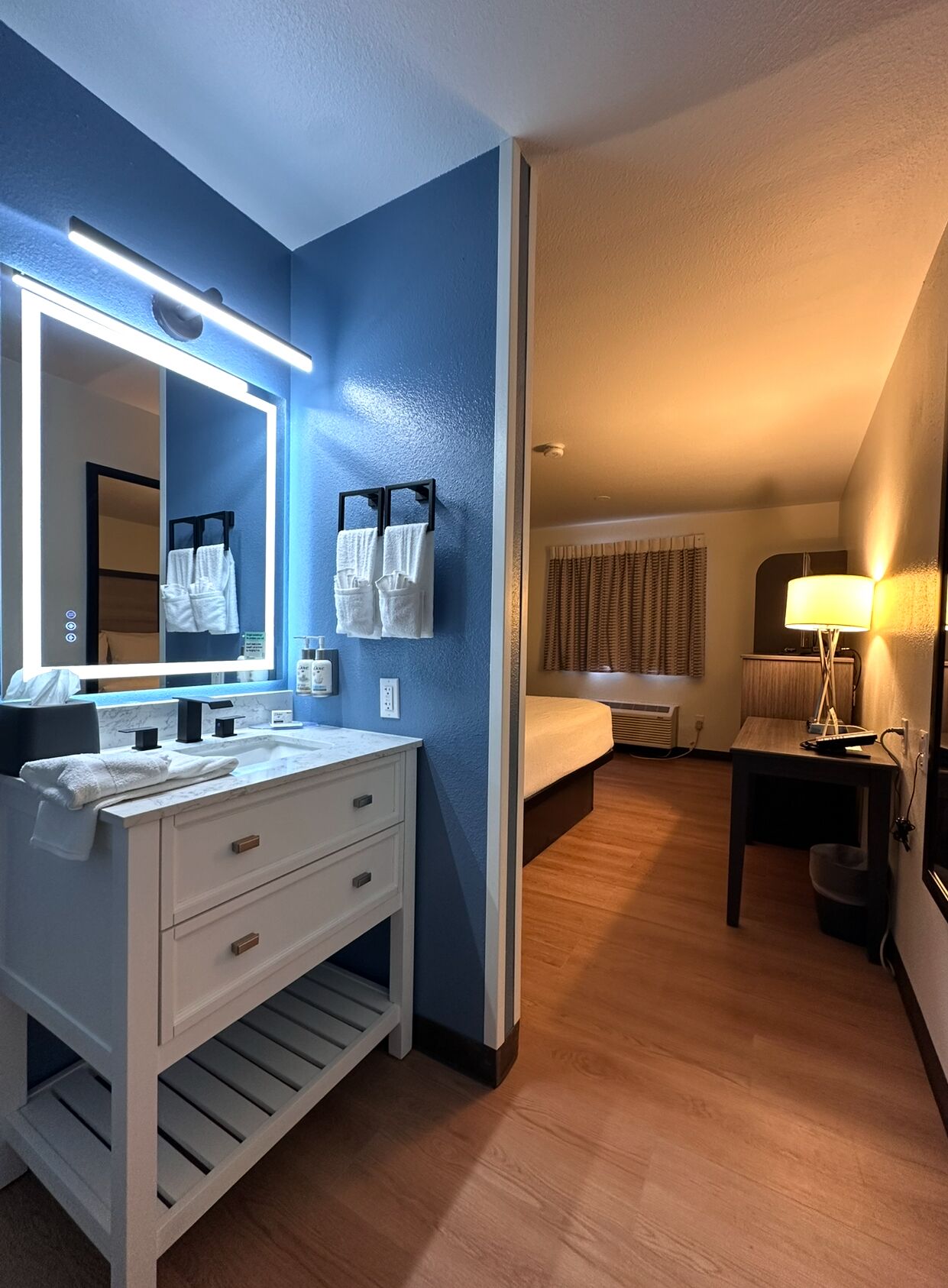 Premium bedding, down duvets, Tempur-Pedic beds, desk