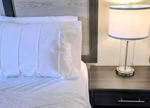 Premium bedding, down duvets, Tempur-Pedic beds, desk