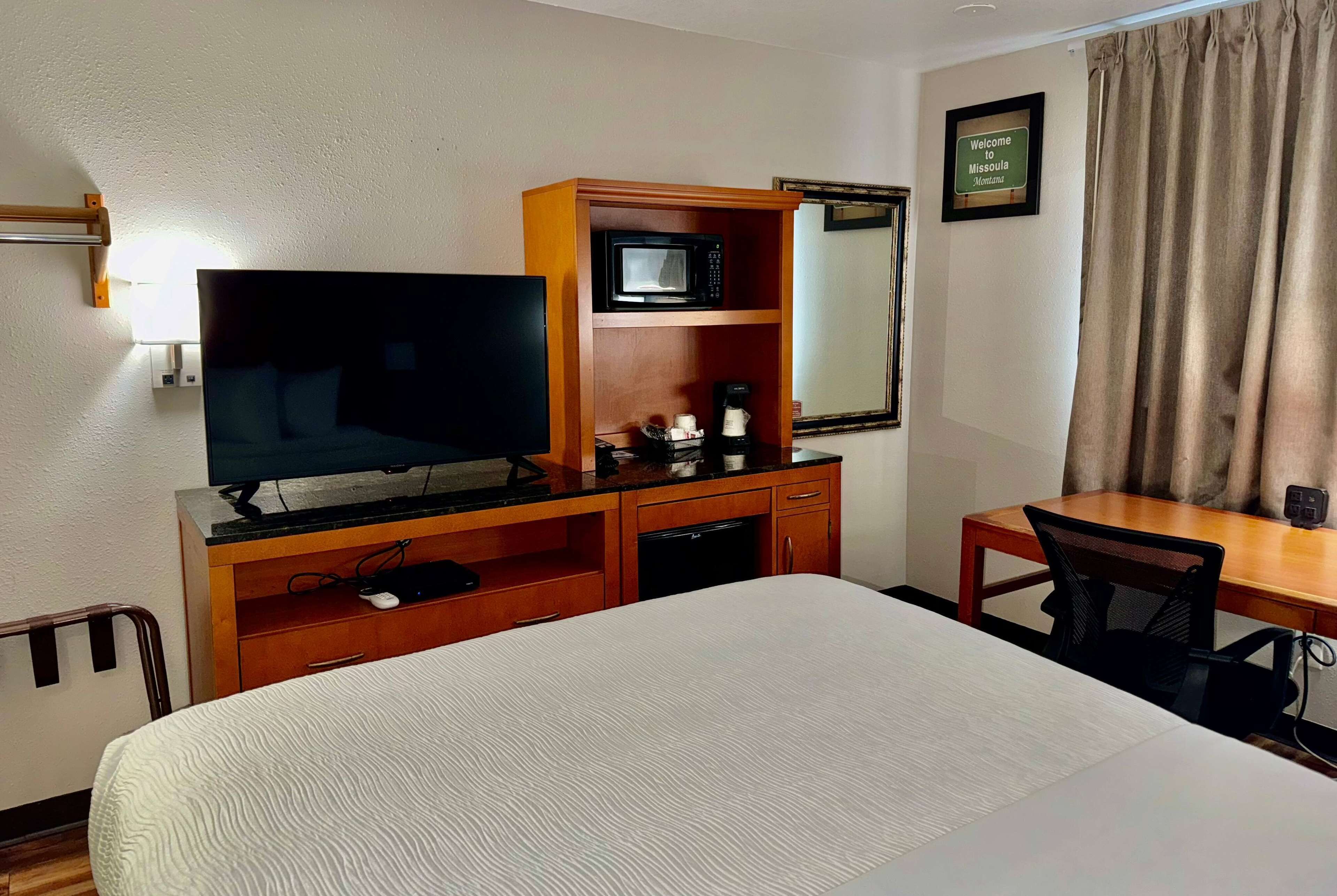 individually furnished, desk, blackout curtains, iron/ironing board