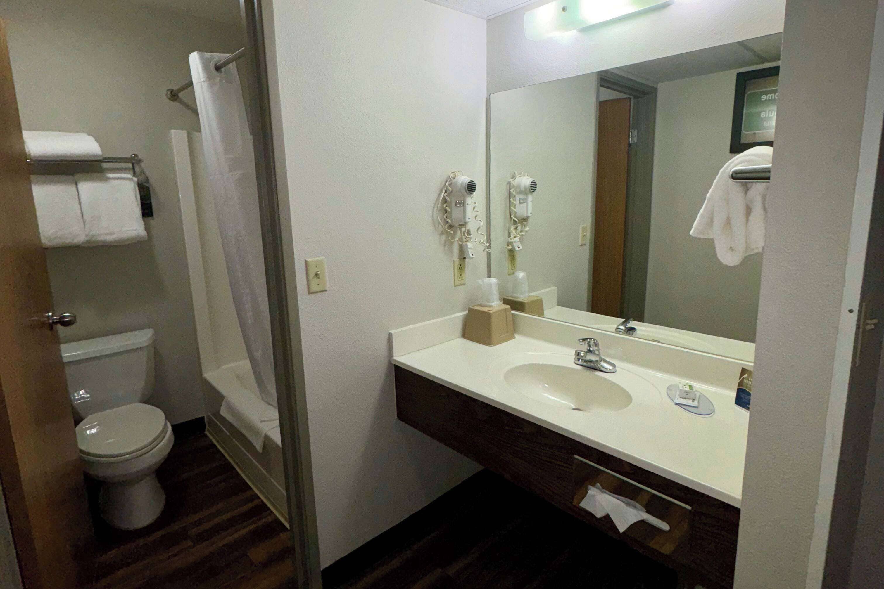 room, 1 queen bed, hearing accessible, non smoking (mobility, roll-in shower) | bathroom | hair dryer, towels