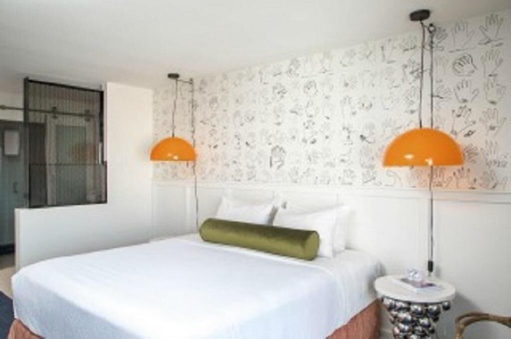 Premium bedding, down comforters, pillowtop beds, minibar
