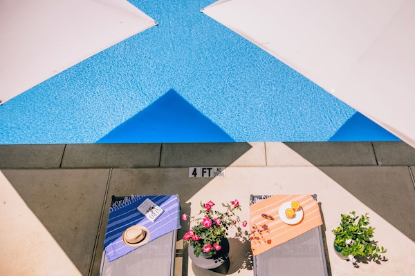 Outdoor pool, open 9:00 AM to 8:00 PM, pool umbrellas, sun loungers