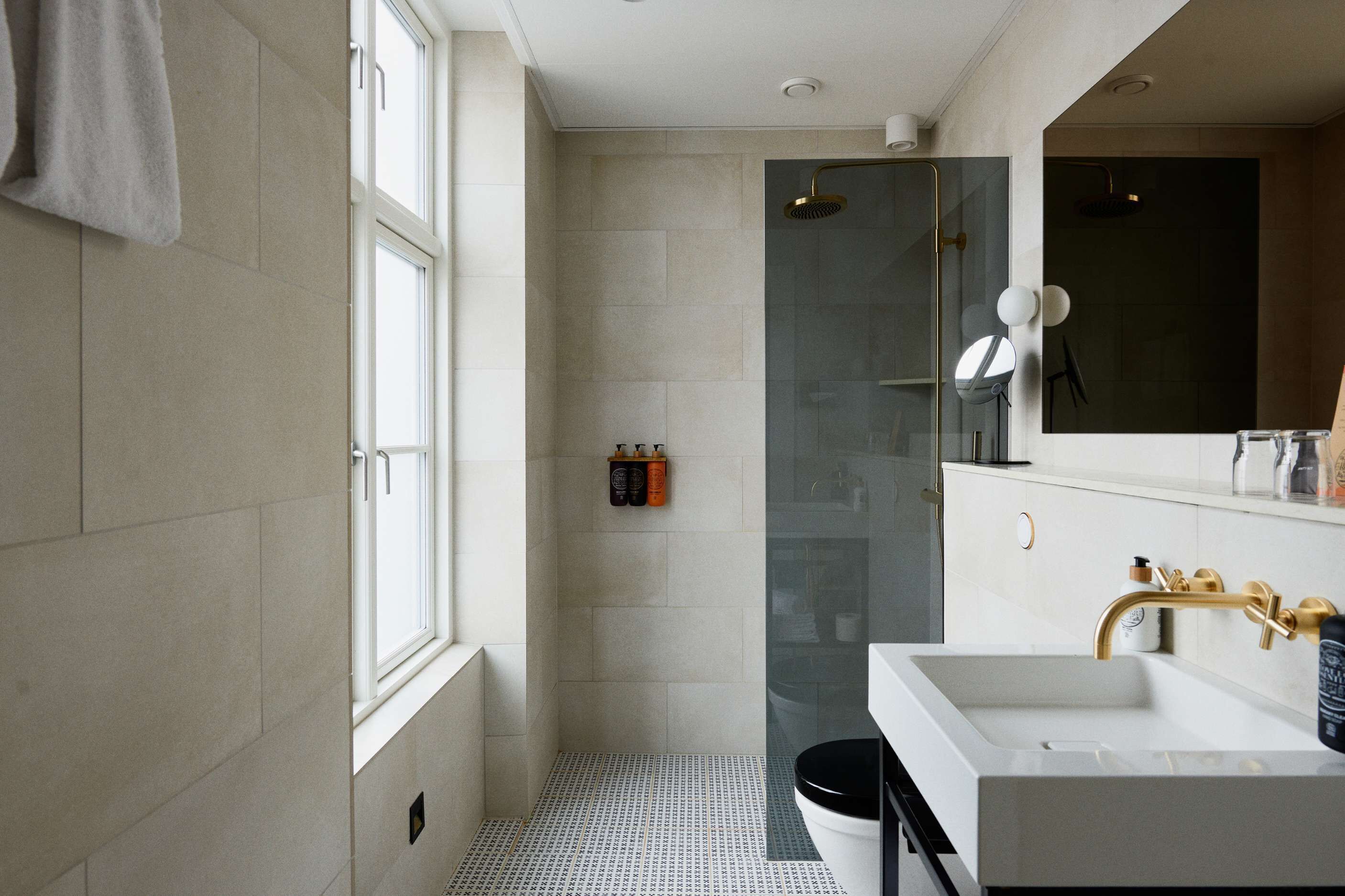 large deluxe | bathroom | shower, hair dryer, towels