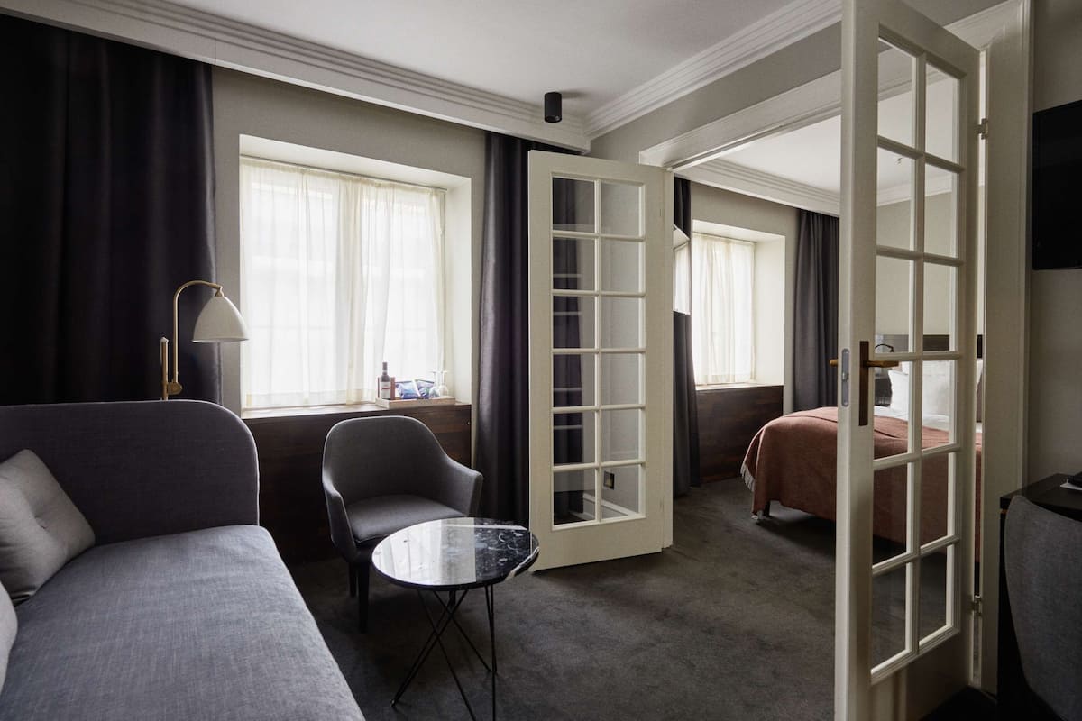 junior suite | 1 bedroom, minibar, in-room safe, desk