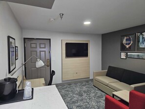 Premium bedding, desk, laptop workspace, blackout curtains