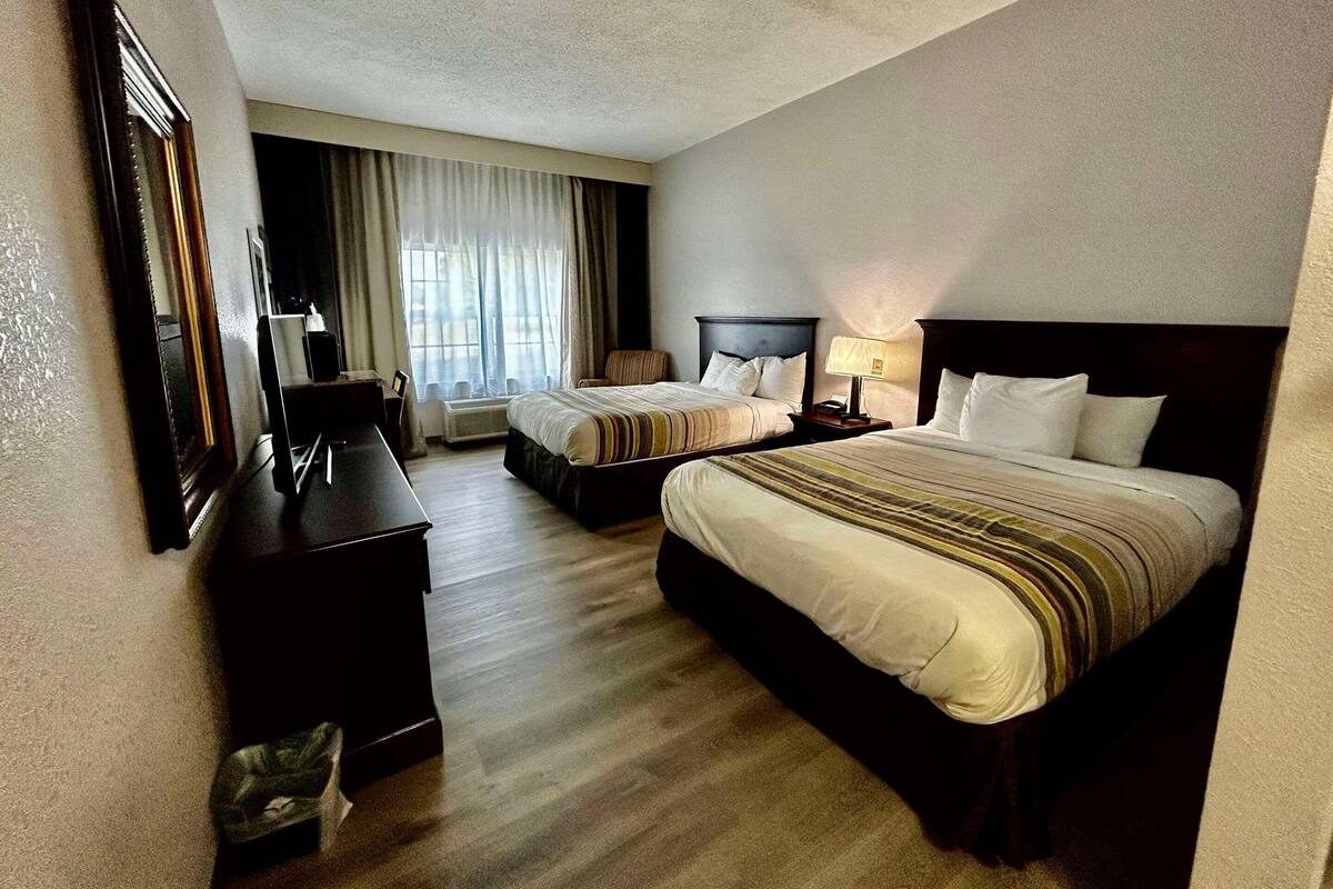 Premium bedding, pillowtop beds, desk, blackout drapes
