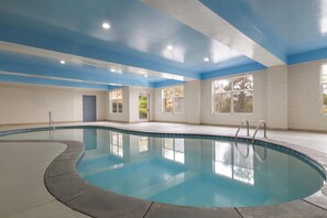 Indoor pool, open 7 AM to 11 PM, sun loungers