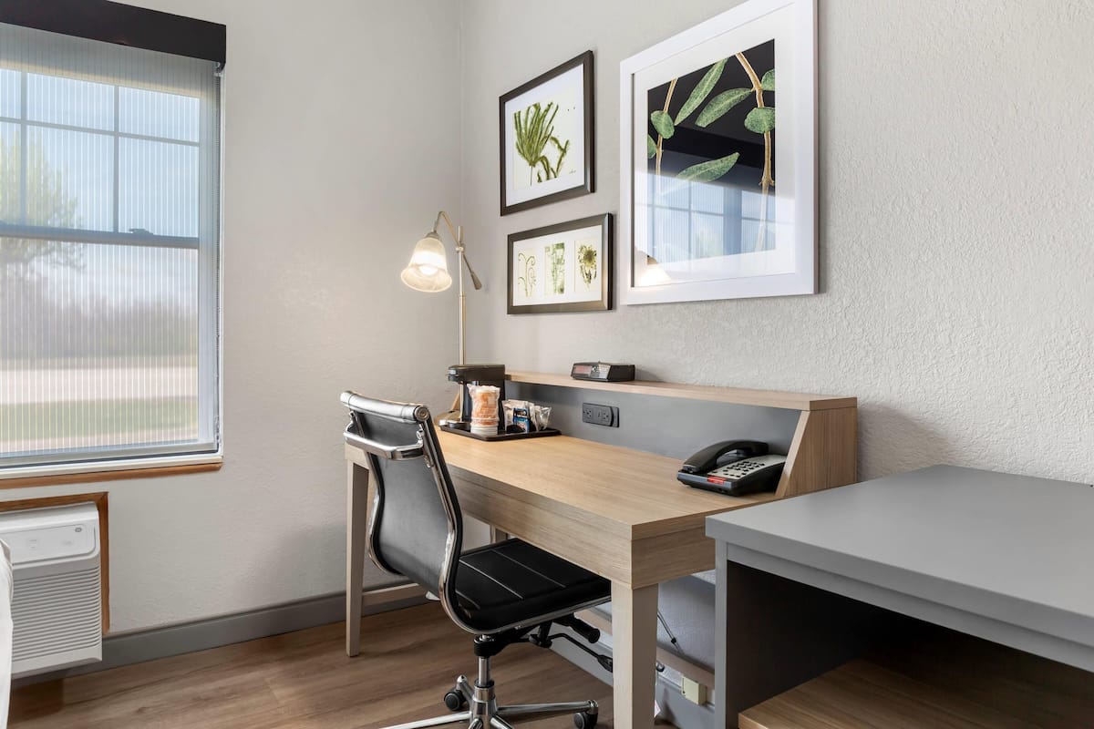 Premium bedding, desk, blackout drapes, iron/ironing board