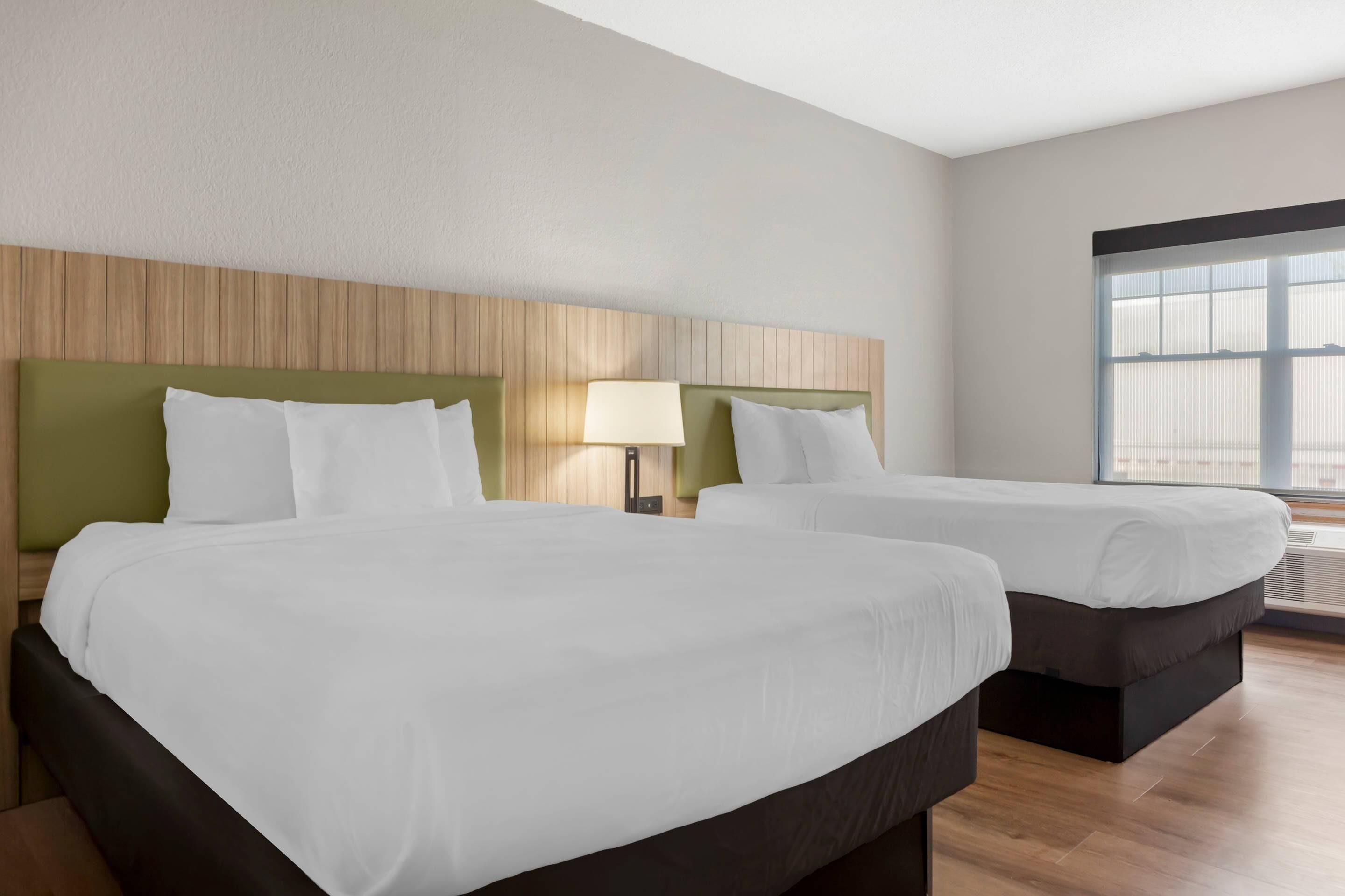 Premium bedding, desk, blackout curtains, iron/ironing board