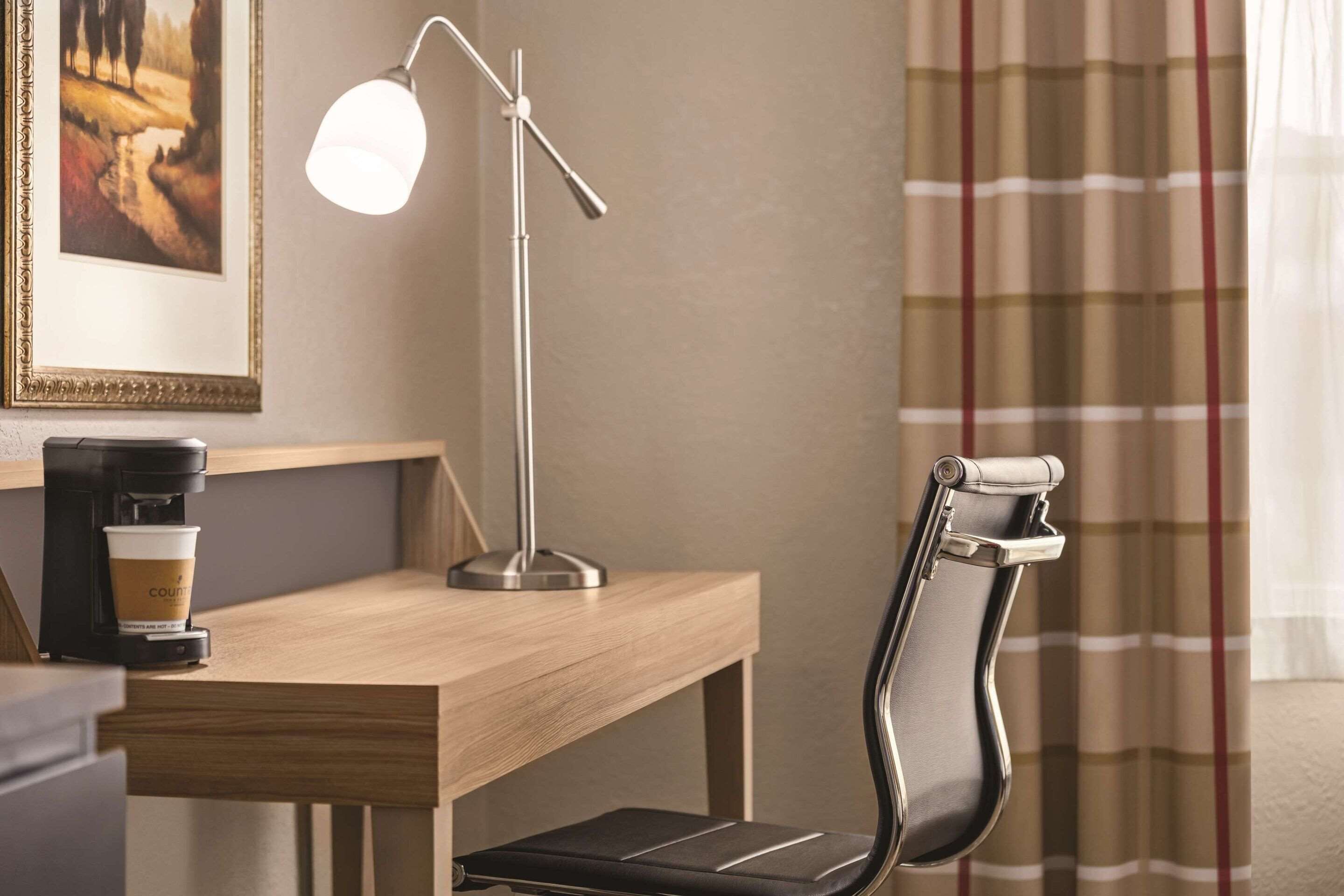 premium bedding, desk, blackout curtains, iron/ironing board