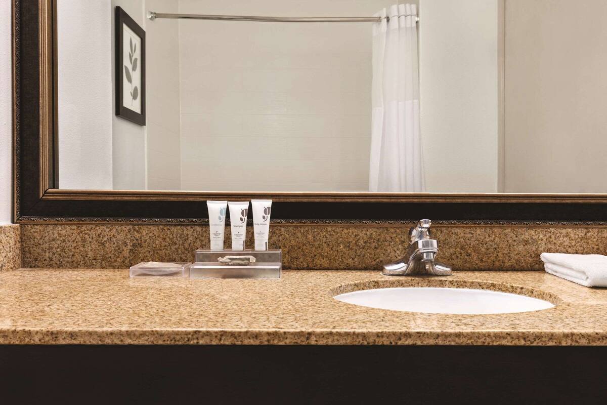 premium bedding, desk, blackout curtains, iron/ironing board