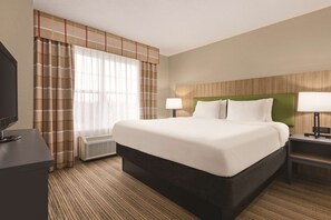 Suite, 2 habitaciones, no fumadores | Ropa de cama de alta calidad, escritorio, cortinas opacas