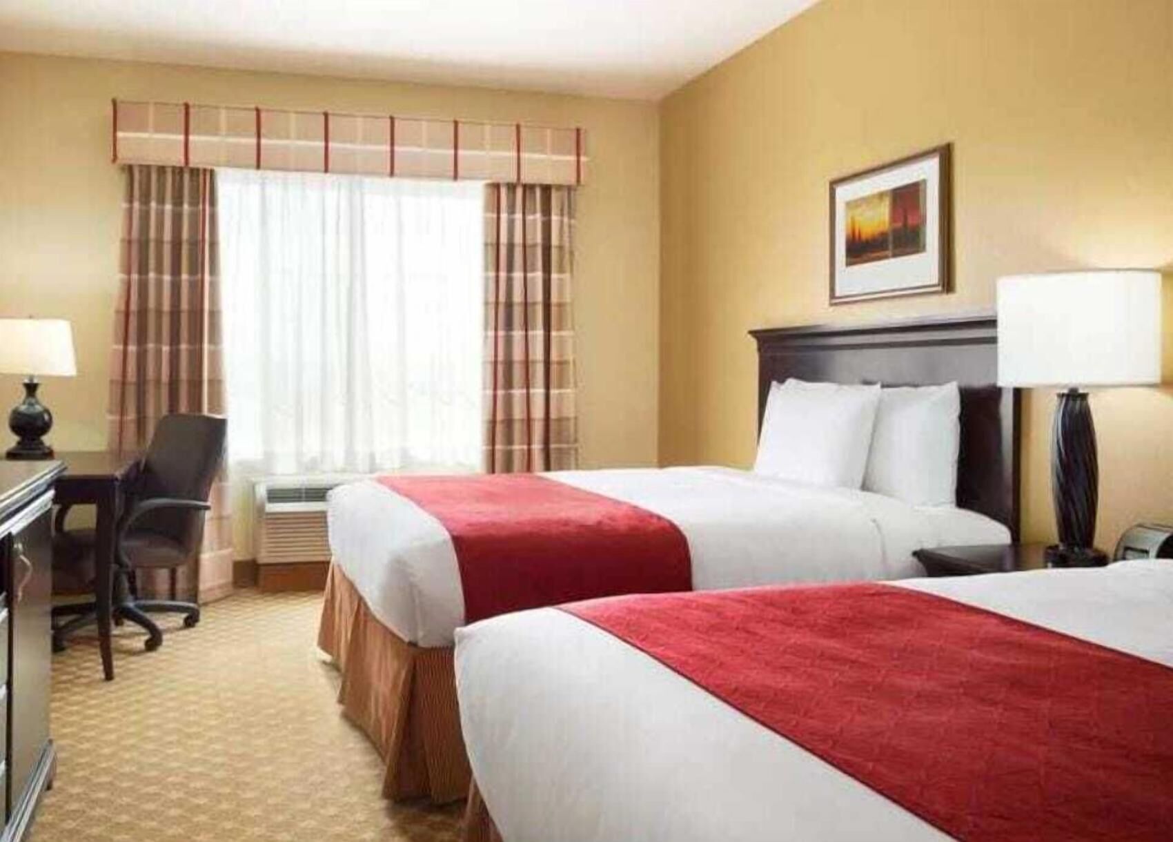Premium bedding, down comforters, in-room safe, desk