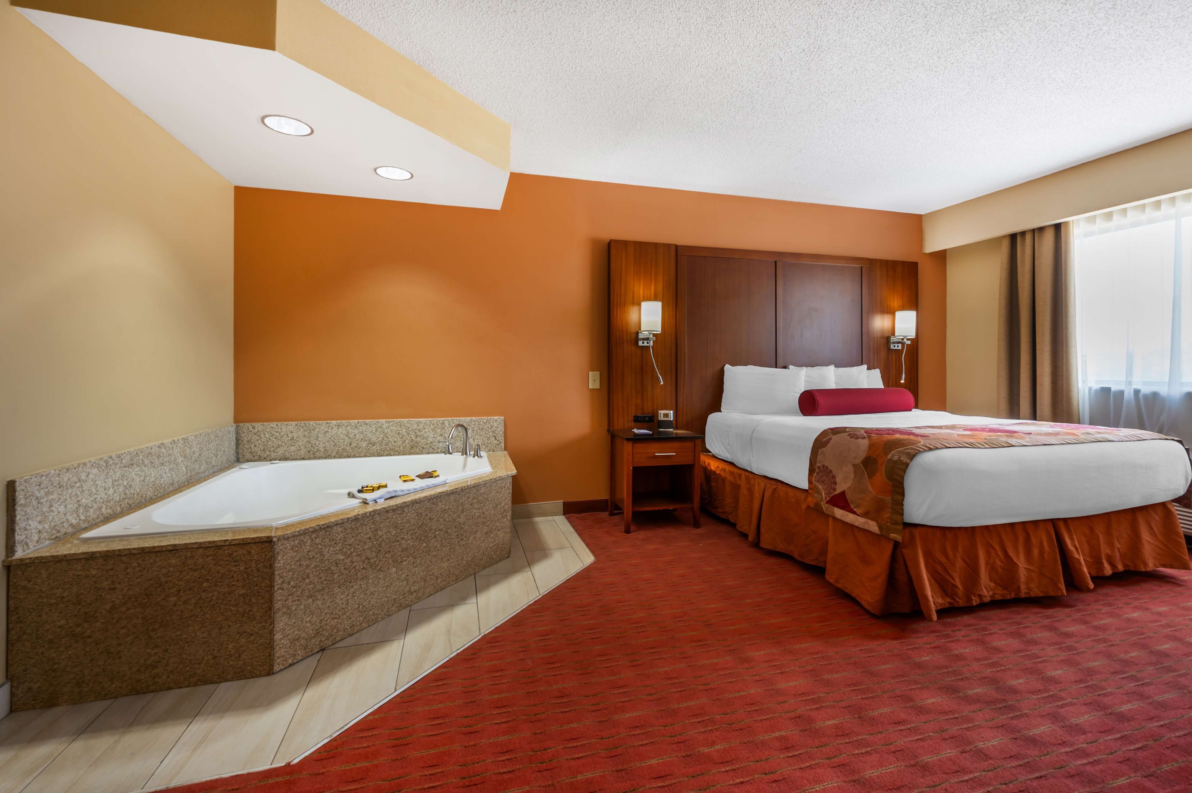 Suite, 1 King Bed, Non Smoking, Jetted Tub (Living Room;with Sofabed) | Desk, blackout drapes, iron/ironing board, cribs/infant beds