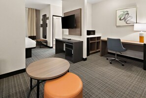 Premium bedding, memory foam beds, desk, laptop workspace