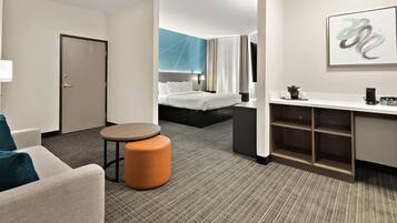 Premium bedding, memory foam beds, desk, laptop workspace