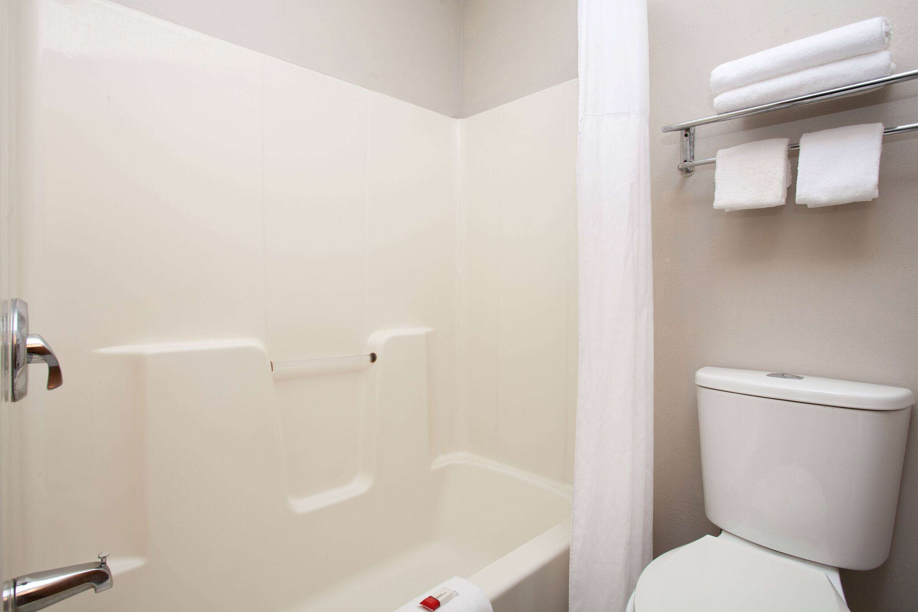deep-soaking bathtub, free toiletries, hair dryer, towels