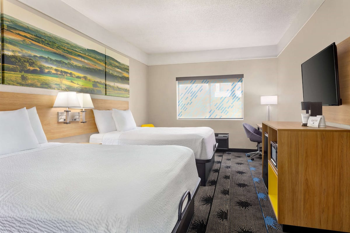 pillow-top beds, desk, blackout curtains, iron/ironing board