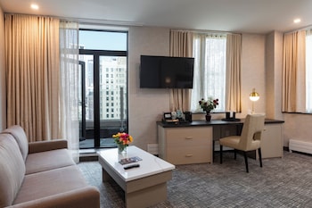Gotham Jr. Suite King Terrace  | Premium bedding, pillowtop beds, in-room safe, desk at Broadway Plaza Hotel