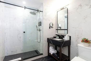 Deluxe Room, 2 Queen Beds  | Bathroom | Designer toiletries, hair dryer, bathrobes, slippers at Broadway Plaza Hotel