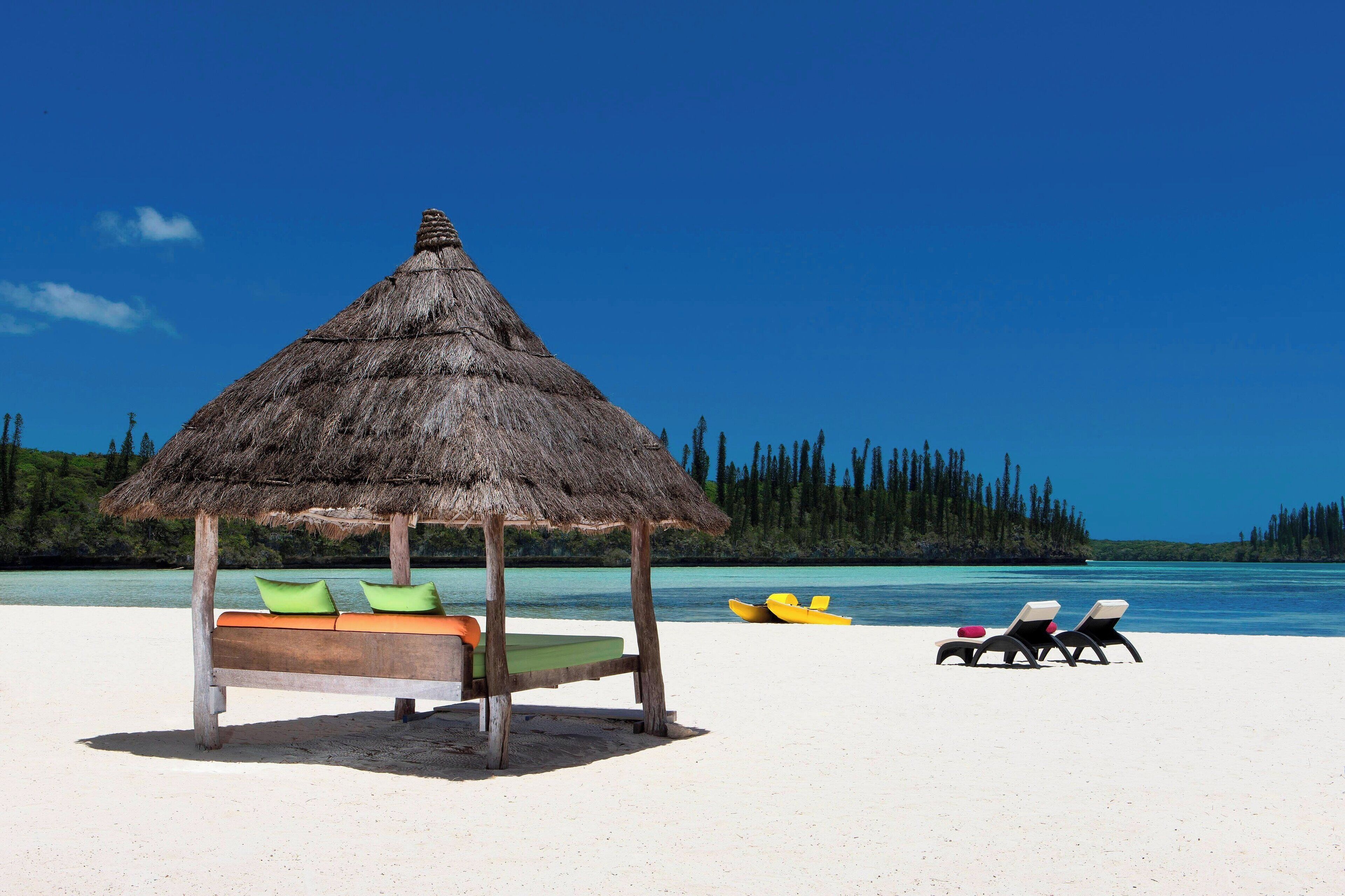 private beach, white sand, free beach cabanas, sun-loungers