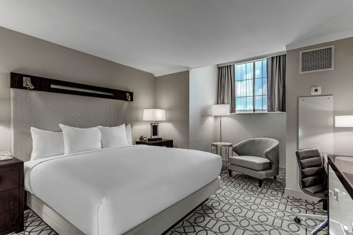 Room, 1 King Bed, Non Smoking (Mini) | Premium bedding, in-room safe, desk, iron/ironing board