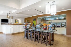 Daily buffet breakfast (USD 15 per person)