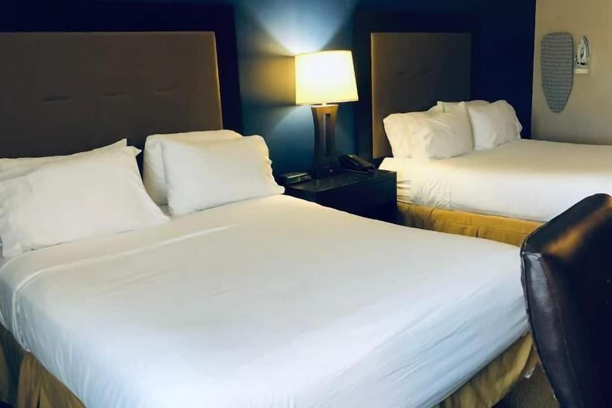 Desk, laptop workspace, blackout drapes, iron/ironing board