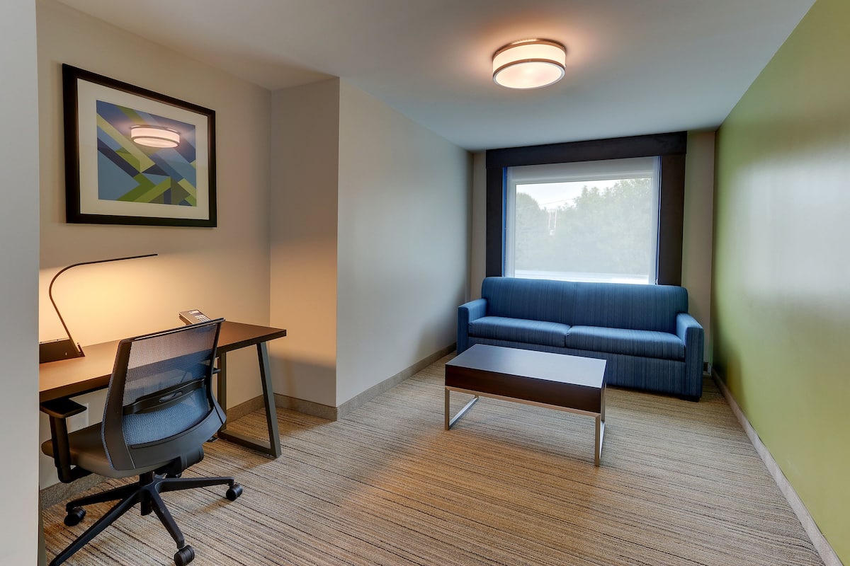 desk, laptop workspace, iron/ironing board, free cots/infant beds